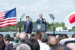 On Dec. 27, 2016, U.S. President Barack Obama speaks on Kilo Pier at Joint Base Pearl Harbor-Hickam while Japanese Prime Minister looks on. President Obama described the U.S.-Japan alliance as the cornerstone of peace and stability in the Asia-Pacific and a force for progress around the globe.