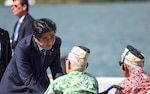 PEARL HARBOR (Dec. 27, 2016) Prime Minister of Japan Shinzo Abe greets Pearl Harbor survivors following a visit to the USS Arizona Memorial and delivering remarks alongside President Barack Obama that focused on reconciliation and peace. Today marks the first time an acting Japanese prime minister has visited the USS Arizona Memorial. 