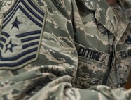 U.S. Air Force Chief Master Sgt. Michael Ditore, 18th Wing command chief, reviews paperwork Dec. 13, 2016, at Kadena Air Base, Japan. Chief master sergeants comprise one percent of the Air Force enlisted structure. Among these top leaders, even fewer achieve the position of command chief. (U.S. Air Force photo by Senior Airman Lynette M. Rolen/Released)