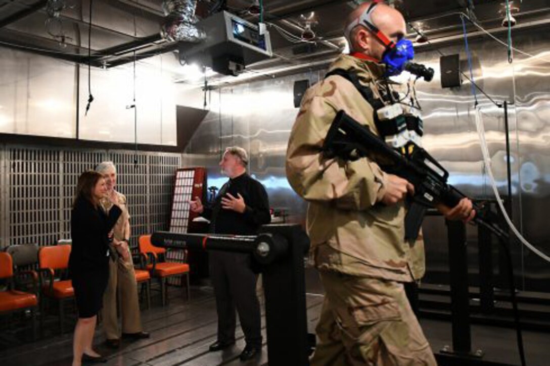 Defense officials tour the Naval Health Research Center's environmental chamber, Oct. 25, 2016.  As the DoD’s premier deployment health research center, NHRC’s cutting-edge research and development is used to optimize the operational health and readiness of the nation’s armed forces. Navy photo by Mayra A. Conde