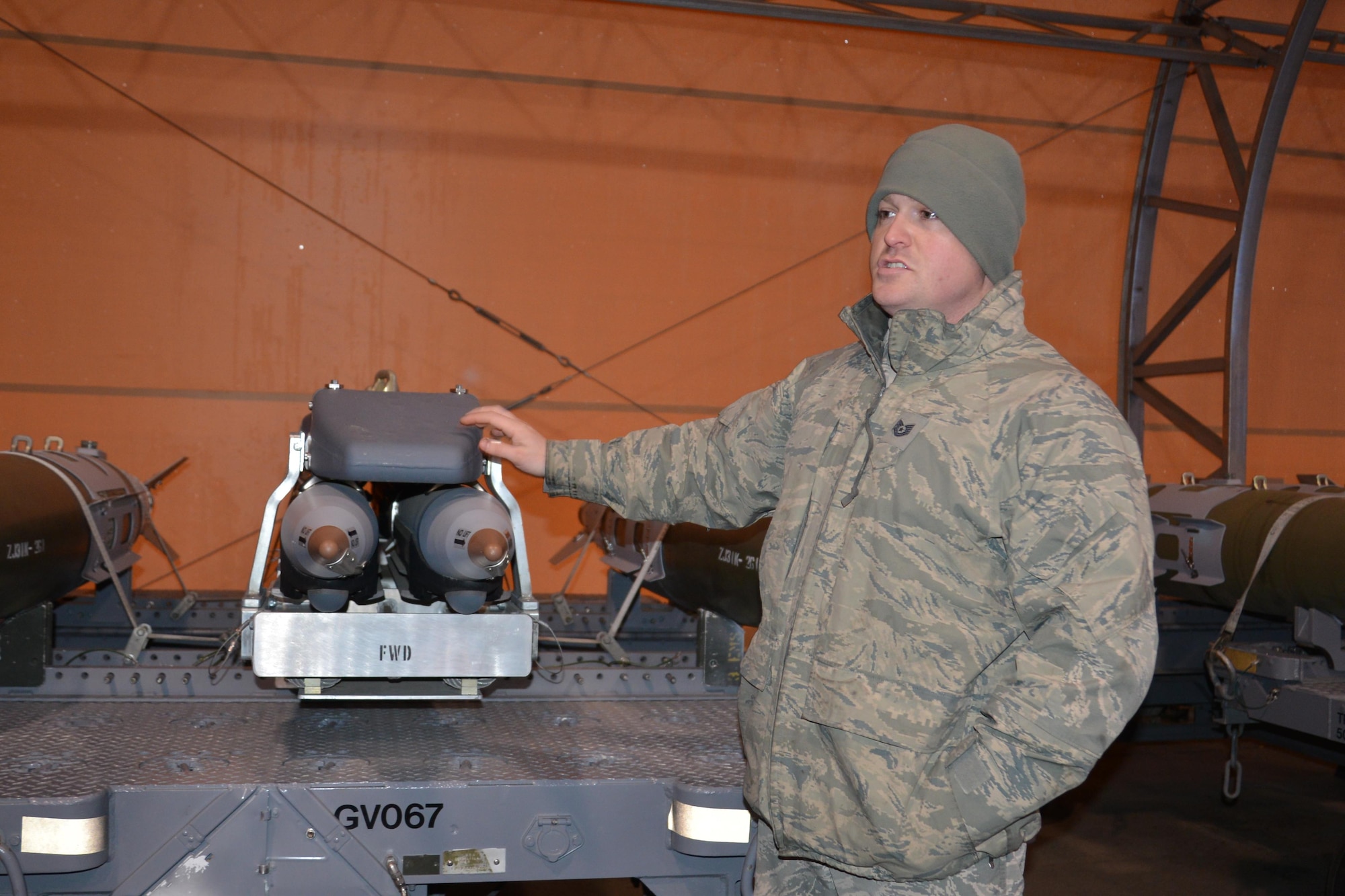 Members of the 477th Fighter Group showcase equipment and capabilities from the 3rd Munitions Flight November 6, 2016. Munitions Systems specialists are Airmen tasked with handling, storing, transporting, arming and disarming non-nuclear weapons systems. The Munitions Systems career field is commonly referred to as "ammo." (Photo by Maj. Barbara Jensen, Released)