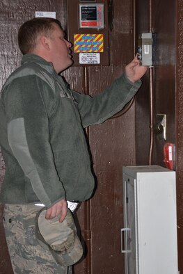 Senior Master Sgt. Keith Long showcases equipment and capabilities from the 3rd Munitions Flight November 6, 2016. Munitions Systems specialists are Airmen tasked with handling, storing, transporting, arming and disarming non-nuclear weapons systems. The Munitions Systems career field is commonly referred to as "ammo." (Photo by Maj. Barbara Jensen, Released)