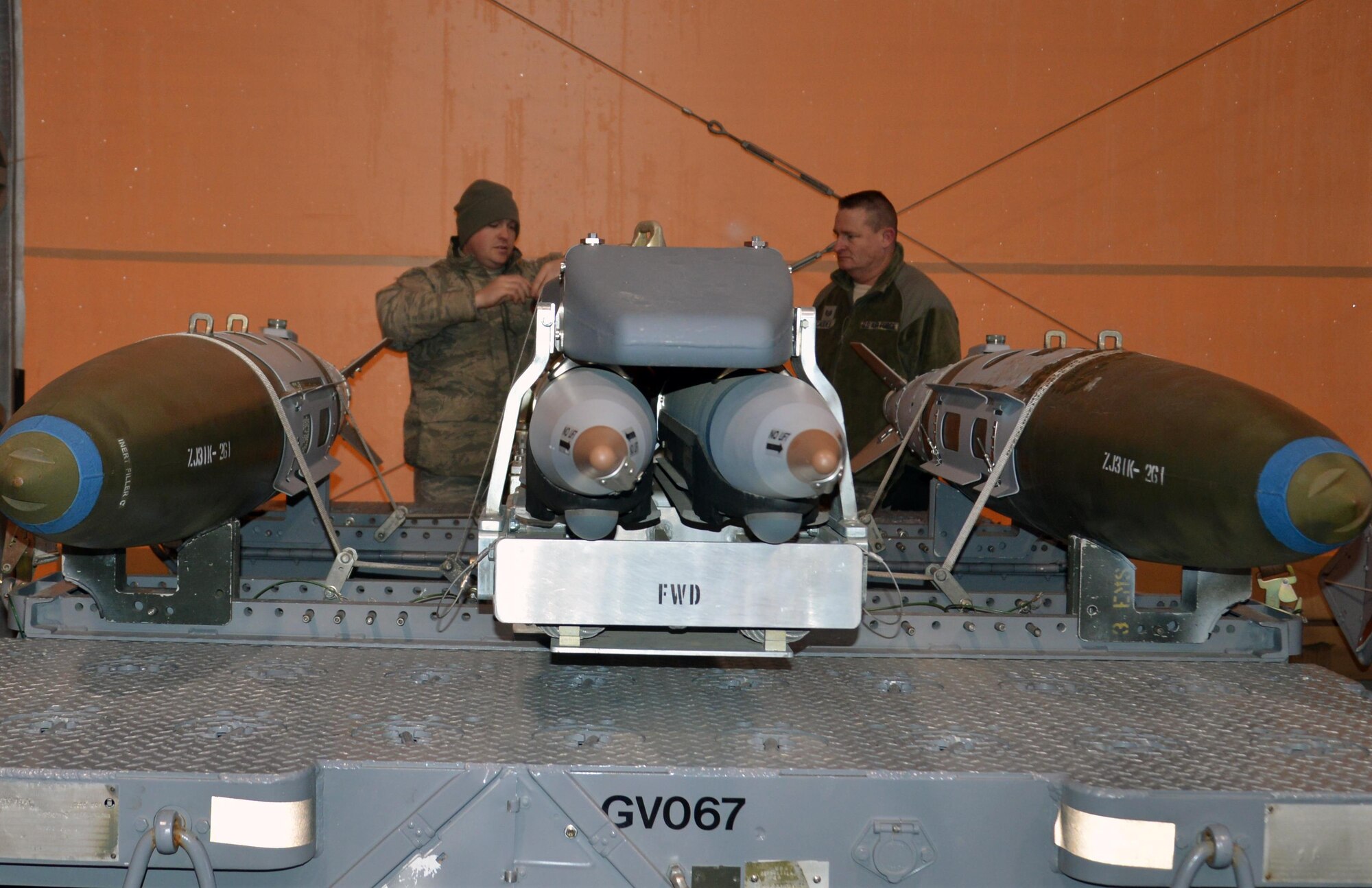 477th Fighter Group members showcase equipment and capabilities from the 3rd Munitions Flight November 6, 2016. Munitions Systems specialists are Airmen tasked with handling, storing, transporting, arming and disarming non-nuclear weapons systems. The Munitions Systems career field is commonly referred to as "ammo." (Photo by Maj. Barbara Jensen, Released)