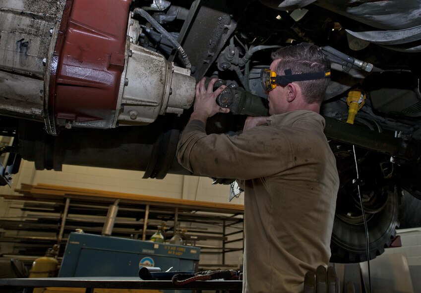 Airman 1st Class Brennan Walley, 5th Logistics Readiness Squadron vehicle maintenance technician, installs a drive shaft on a snow blower at Minot Air Force Base, N.D., Dec. 14, 2016. Airmen in the 5th LRS special purpose shop perform maintenance on various types of equipment, from gasoline and diesel engines, to hydraulic and air systems. (U.S. Air Force photo/Airman 1st Class Jonathan McElderry)