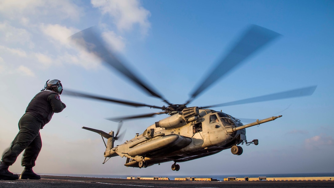 A U.S. Marine CH-53E Super Stallion, assigned to the Ridge Runners of Marine Medium Tiltrotor Squadron 163, takes off from the flight deck of the amphibious assault ship USS Makin Island during a helo-borne raid as part of Exercise Alligator Dagger, in the Gulf of Aden, Dec. 21. 2016. The unilateral exercise provides an opportunity for the Makin Island Amphibious Ready Group and 11th Marine Expeditionary Unit to train in amphibious operations within the U.S. 5th Fleet area of operations. The 11th MEU is currently supporting U.S. 5th Fleet’s mission to promote and maintain stability and security in the region. 