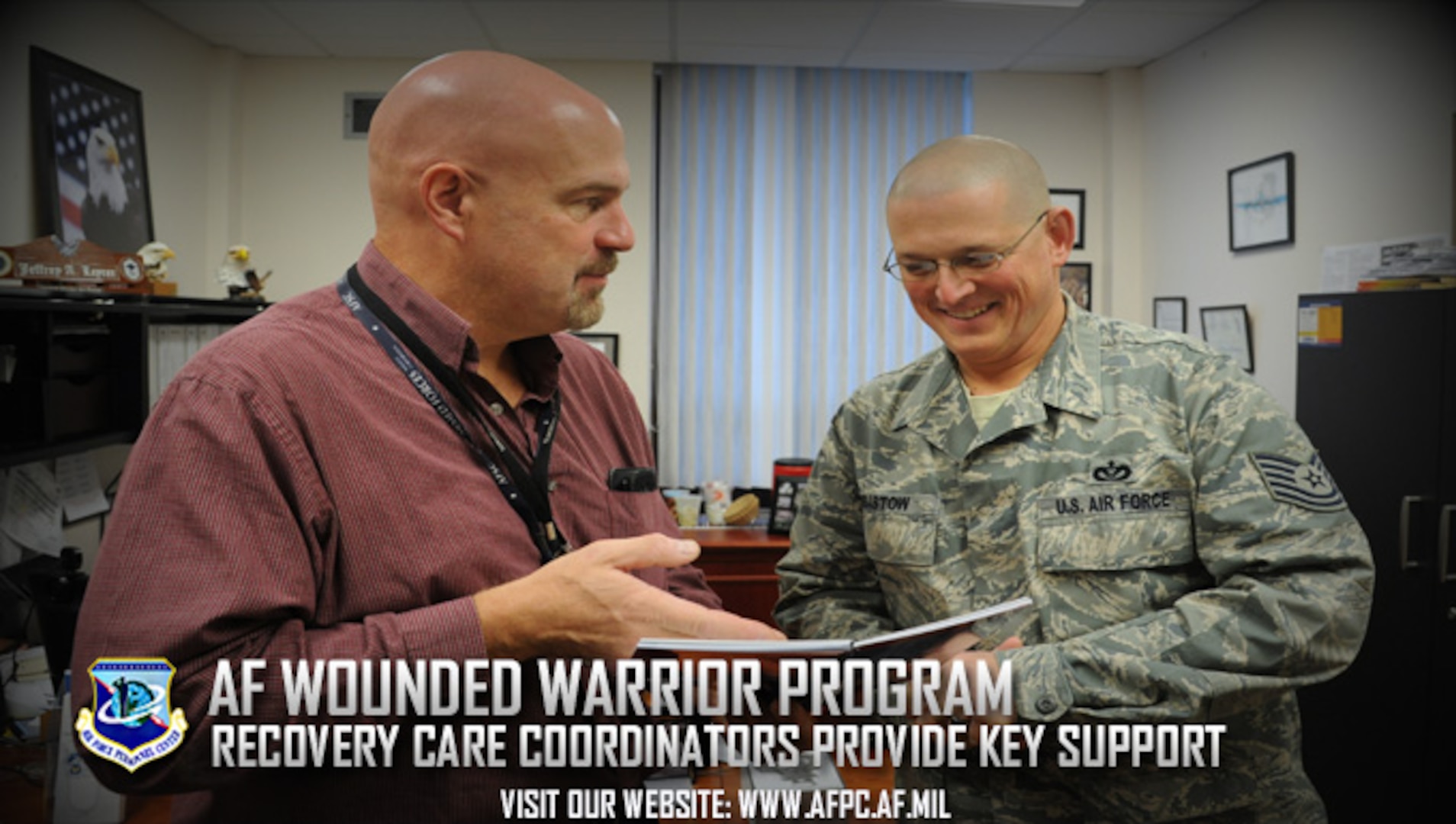 Recovery Care Coordinator Jeffrey Leyrer discusses programs and benefits with Tech. Sgt. Joshua Robistow in the Medical Treatment Facility on Grand Forks Air Force Base, North Dakota. Leyrer is one of 42 RCCs who are strategically placed at bases throughout the Air Force. (U.S. Air Force courtesy photo)