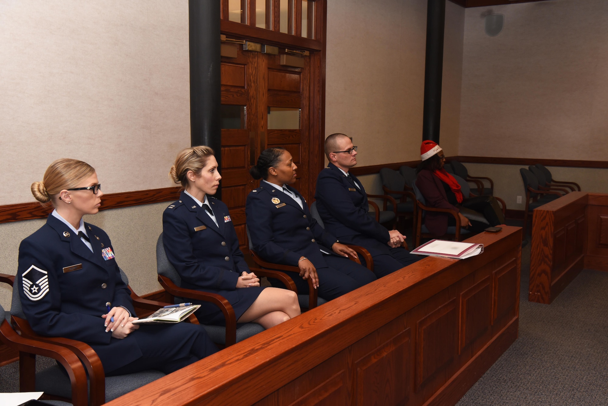 Members of the 90th Missile Wing legal office observe the mock trial at F.E. Warren Air Force Base, Wyo. Dec. 16, 2016. The legal office recently initiated a program for first term Airmen. “Got Consent” is designed to confront participants with the consequences of sexual assault from various perspectives. (U.S. Air Force photo by Airman 1st Class Breanna Carter)