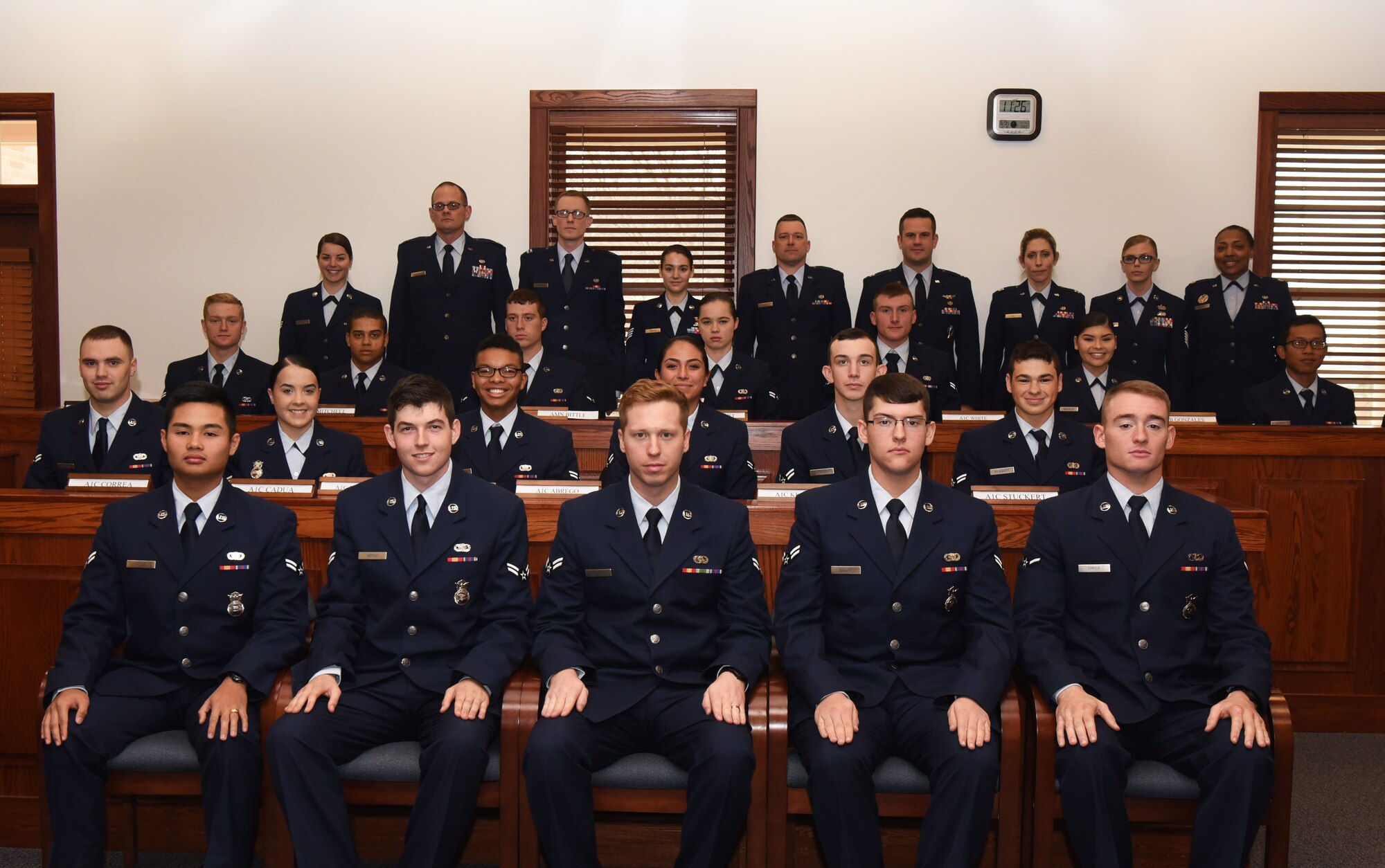 The 90th Missile Wing legal office staff sits with the first term Airmen who served as jury members for a mock trial at F.E. Warren Air Force Base, Wyo., Dec. 16, 2016. The legal office recently initiated the program called “Got Consent” which is designed to confront participants with the consequences of sexual assault from various perspectives. (U.S. Air Force photo by Airman 1st Class Breanna Carter)