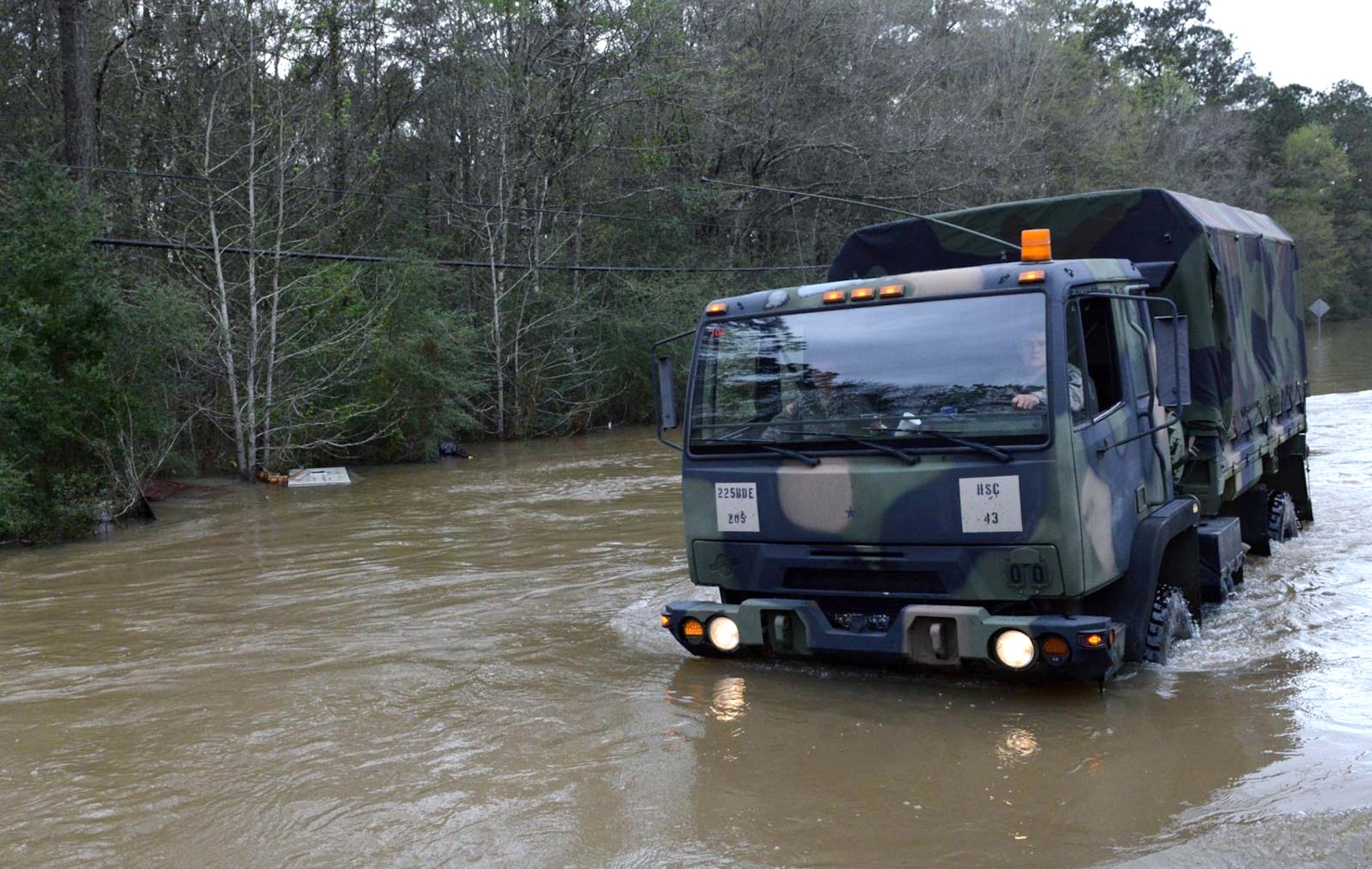 Soldiers from the Louisiana Army National Guard navigate a flooded road while responding to severe flooding in the southern part of the state in March. This year saw thousands of Guard members respond to floods in Louisiana, as well as the East Coast, parts of Wisconsin and West Virginia. Guard members also responded to a variety of other natural disasters, deployed overseas, continued to train for additional missions and wrapped up a busy 2016 with preparations for taking part in the 58th presidential inauguration. 