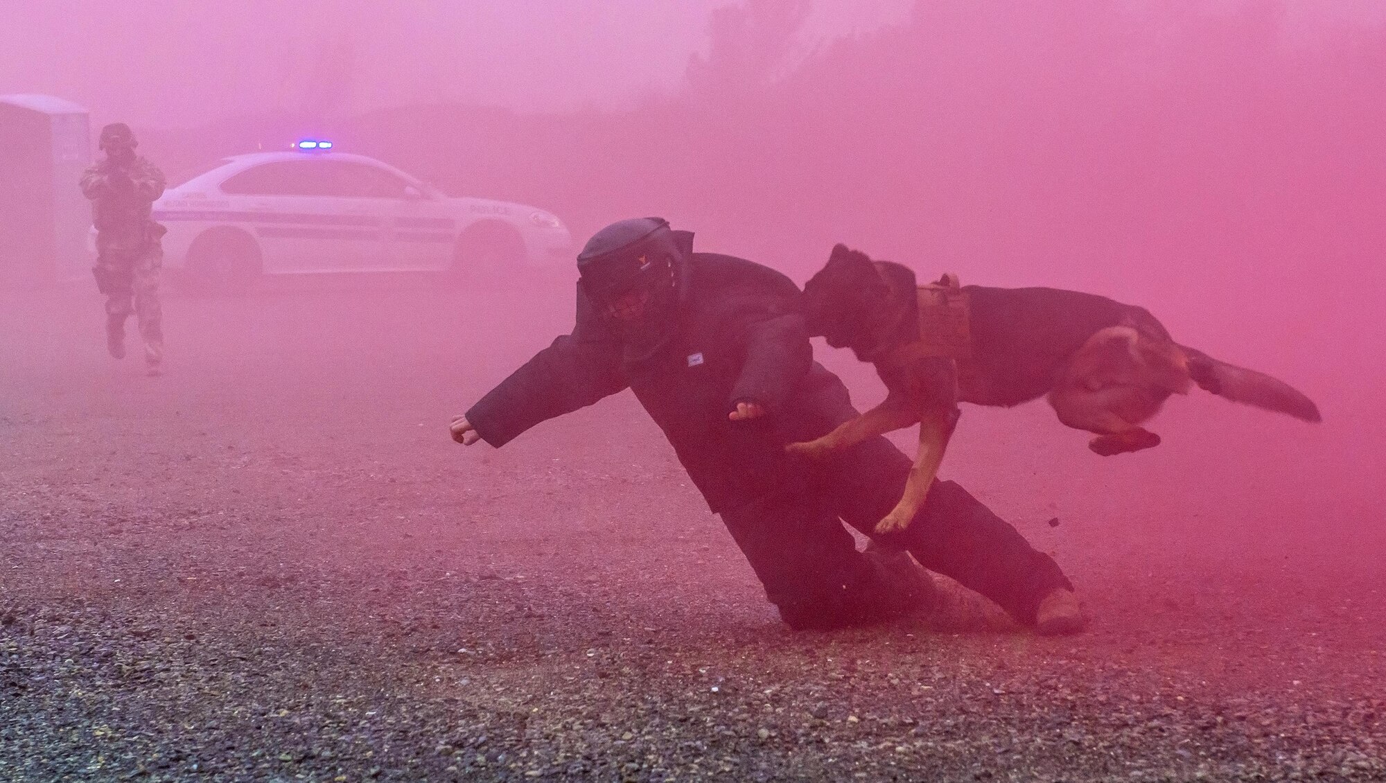 Law enforcement personnel gave a demonstration during the ribbon cutting ceremony of the opening of the Emergency Responder Urban Training Site, Jan 29, 2016, Travis AFB, California. The site is situated in a remote part of the base that will safely provide an urban training area for combined military and municipal law enforcement agencies.(U.S. Air Force Photo by Heide Couch/Released)