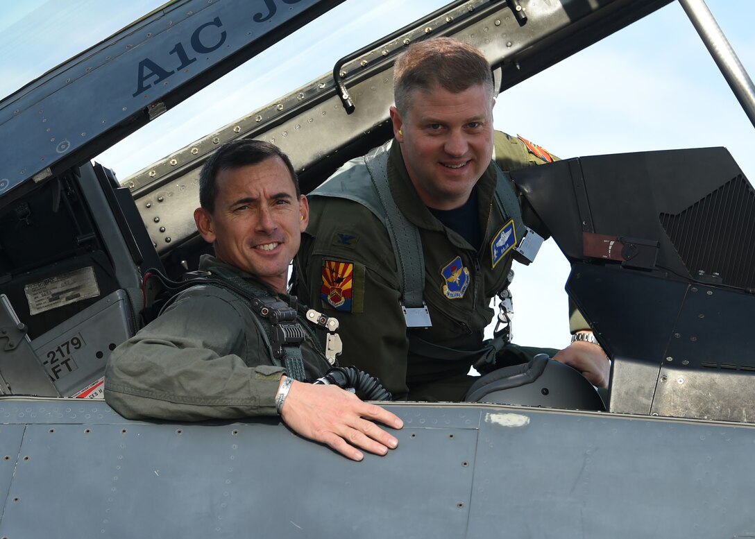 Col. David Shoemaker, 56th Fighter Wing vice commander, and Col. James Wright, Garrison Commander, Fort Huachuca, pose before taking off on their familiarization flight Dec. 30, 2016 at Luke Air Force Base, Ariz. Wright visited the base to become more familiar with the mission and the aircraft assigned to Luke.  (U.S. Air Force photo by Senior Airman Devante Williams)