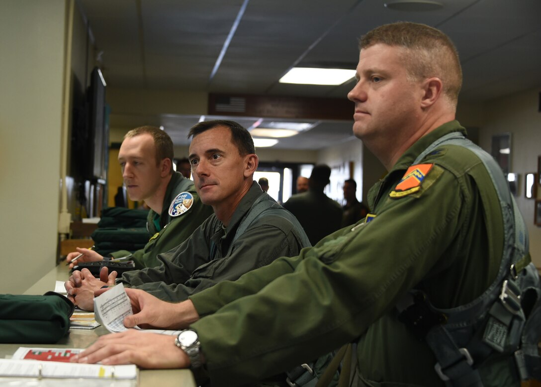 Col. David Shoemaker, 56th Fighter Wing vice commander, and Col. James Wright, Garrison Commander, Fort Huachuca, receive a pre-flight briefing before stepping to the aircraft Dec. 30, 2016 at Luke Air Force Base, Ariz. Wright is the Garrison commander at Ft. Huachuca, home of the U.S. Army Intelligence Center and the U.S. Army Network Enterprise Technology Command. (U.S. Air Force photo by Senior Airman Devante Williams)