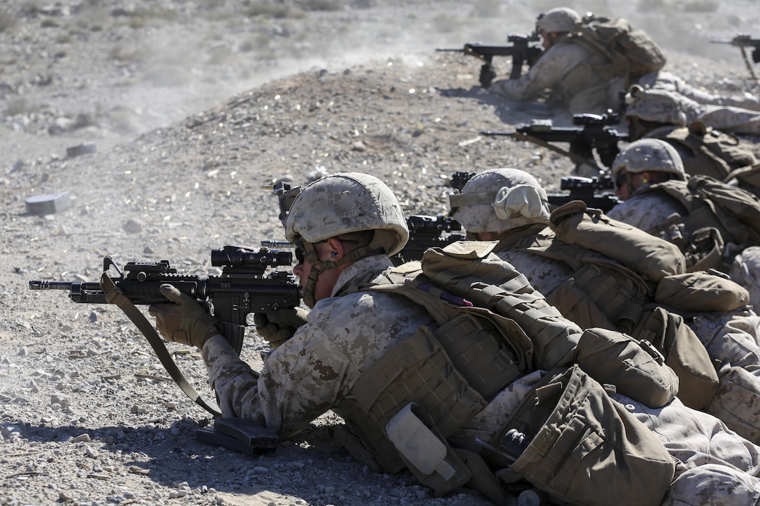 Marines assault simulated enemy targets during live-fire training on Marine Corps Air Ground Combat Center Twentynine Palms, Calif., Jan. 24, 2016. Marine Corps photo by Cpl. Danielle Rodrigues