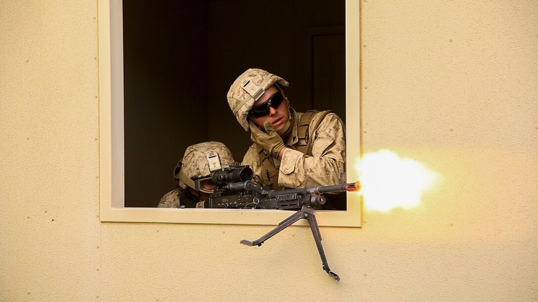 Marines assault simulated enemy targets during urban warfare training on Marine Corps Air Ground Combat Center Twentynine Palms, Calif., Jan. 26, 2016. Marine Corps photo by Cpl. Danielle Rodrigues