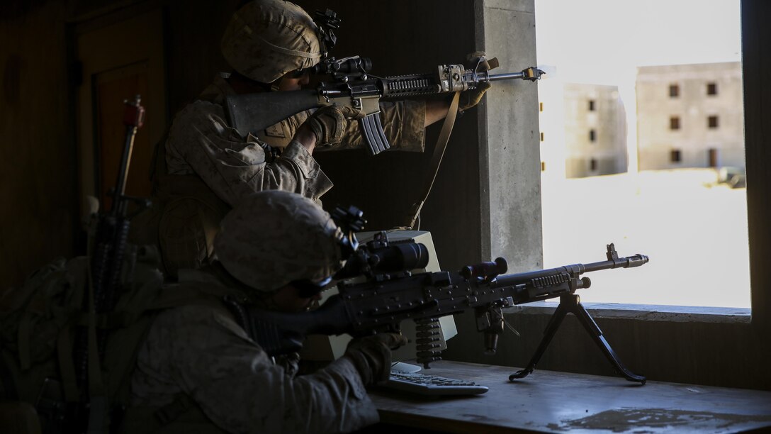 Marines provide security during urban warfare training on Marine Corps Air Ground Combat Center Twentynine Palms, Calif., Jan. 26, 2016. Marine Corps photo by Cpl. Danielle Rodrigues