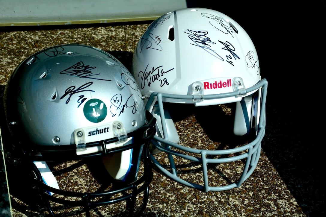 NFL players signed hundreds of autographs onto items like these helmets at the 2016 Pro Bowl Draft show on Wheeler Army Airfield, Hawaii, Jan. 27, 2016. U.S. Army photo by Sgt. 1st Class John Brown