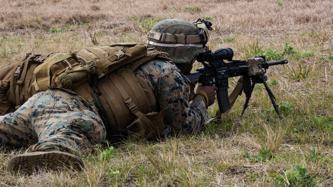 Lance Cpl. Curtis L. Brown, a rifleman with Company F, 2nd Battalion, 8th Marine Regiment, assaults targets down range during a field exercise at Marine Corps Base Camp Lejeune, N.C., Jan. 28, 2016. The company reinforced infantry fundamentals at all levels, beginning with fire team tactics before advancing to squad-level exercises. 