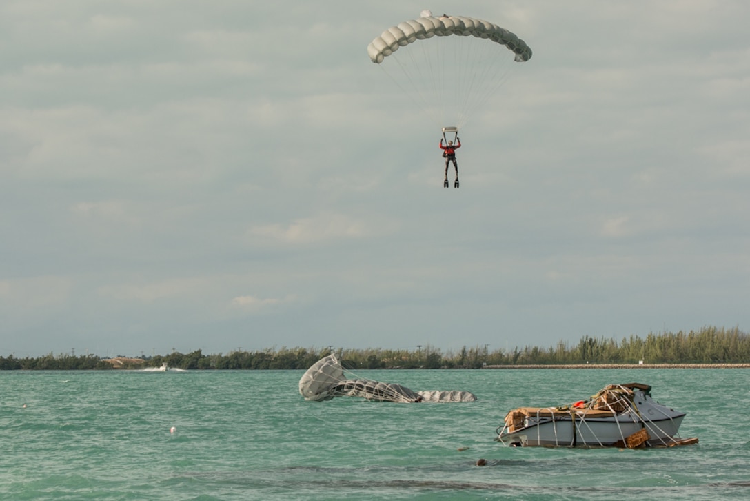 An Air Force pararescueman descends over the Patton drop zone during Operation Jesse Relief, a joint search and rescue exercise in Key West, Fla., Jan. 25, 2016. Missouri Air National Guard photo by Senior Airman Sheldon Thompson