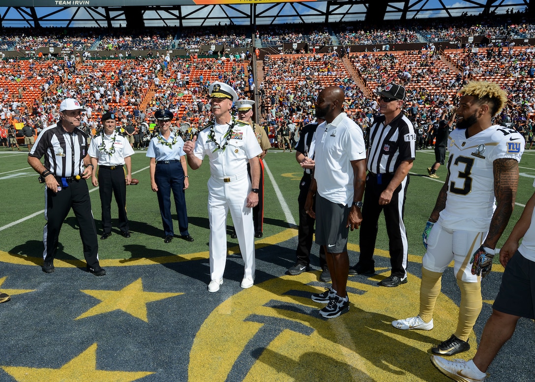 Navy Adm. Scott Swift, commander of U.S Pacific Fleet, participates in the opening coin toss during the 2016 Pro Bowl at Aloha Stadium in Honolulu, Jan. 31, 2016. U.S. Navy photo by Petty Officer 2nd Class Brian M. Wilbur