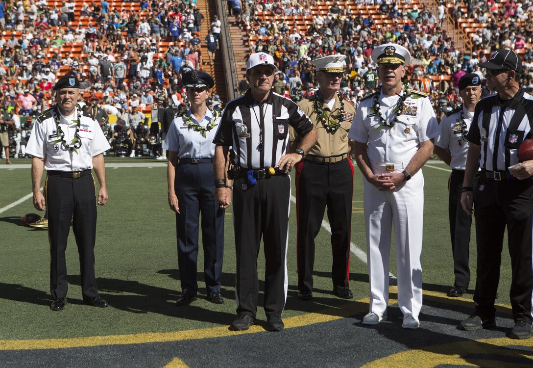From left, National Guard Brig. Gen. Bruce E. Oliveira, commander of Land Component Command, Hawaii National Guard; Air Force Gen. Lori J. Robinson, commander of U.S. Pacific Air Forces; Marine Corps Lt. Gen. John A. Toolan, commander of U.S. Marine Corps Forces Pacific; Navy Adm. Scott Swift, commander of U.S. Pacific Fleet; and Army Brig. Gen. Brian P. Fenton, U.S. Army Pacific's chief of staff of operations, listen to the referee’s final instructions prior to the coin toss during the 2016 NFL Pro Bowl at Aloha Stadium in Honolulu, Jan. 31, 2016. This year marks the 35th Pro Bowl held at Aloha Stadium and commanders from each component command were present for the coin toss. U.S. Marine Corps photo by Sgt. Erik Estrada