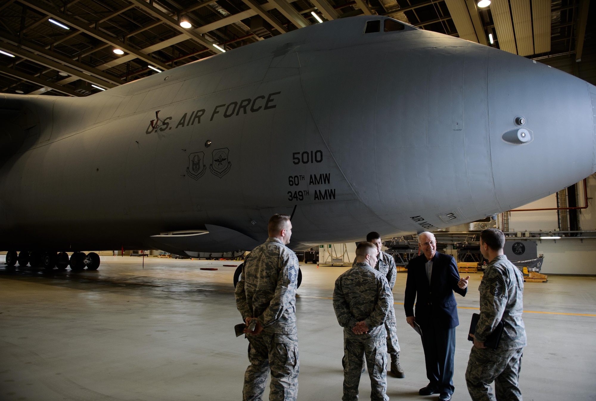 The eighth chief master sergeant of the Air Force, Sam E. Parish, interacts with Airmen of the 721st Aircraft Maintenance Squadron Jan. 27, 2016, at Ramstein Air Base, Germany. Airmen from the 521st Air Mobility Operations Wing had an opportunity to meet Parish and discuss the differences from when Parish enlisted and the current Air Force. Parish was the guest speaker at a variety of venues including Airman leadership school, squadron all calls, and the chief induction ceremony as part of his visit. (U.S. Air Force photo/Staff Sgt. Armando A. Schwier-Morales) 