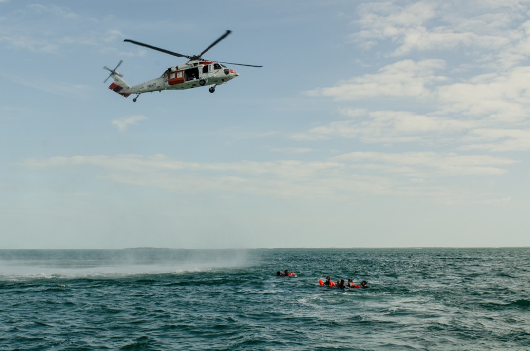 Airmen participate in water survival training with sailors during Operation Jesse Relief, a joint search and rescue exercise off the coast of Key West, Fla., Jan. 26, 2016.Missouri Air National Guard photo by Senior Airman Sheldon Thompson