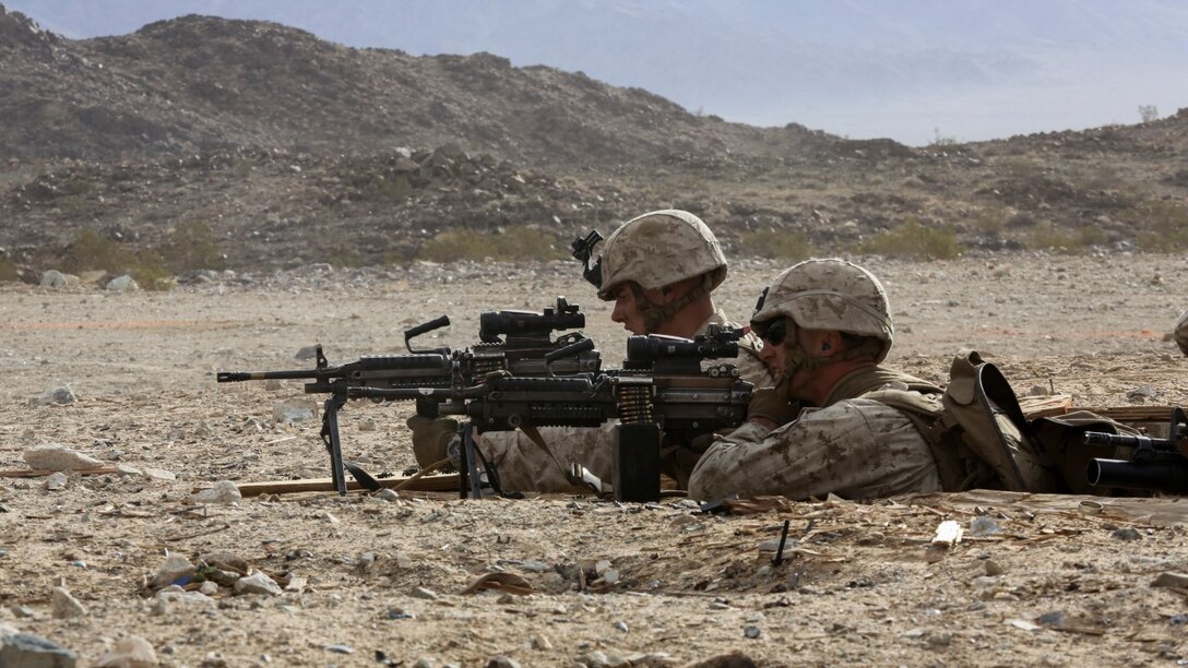 Marines with Company G, 2nd Battalion, 7th Marine Regiment, 1st Marine Division, assault simulated enemy targets during a platoon level live-fire attack aboard Marine Corps Air Ground Combat Center Twentynine Palms, Calif., Jan. 23, 2016. The training was part of a series that will take place during Integrated Training Exercise 2-16, a Marine Air Ground Task Force sized training event led by the 5th Marine Regiment, which will forward deploy later this year with various elements to create the Special Purpose MAGTF Crisis Response Central Command 16.2. (U.S. Marine Corps photo by Cpl. Danielle Rodrigues/Released)
