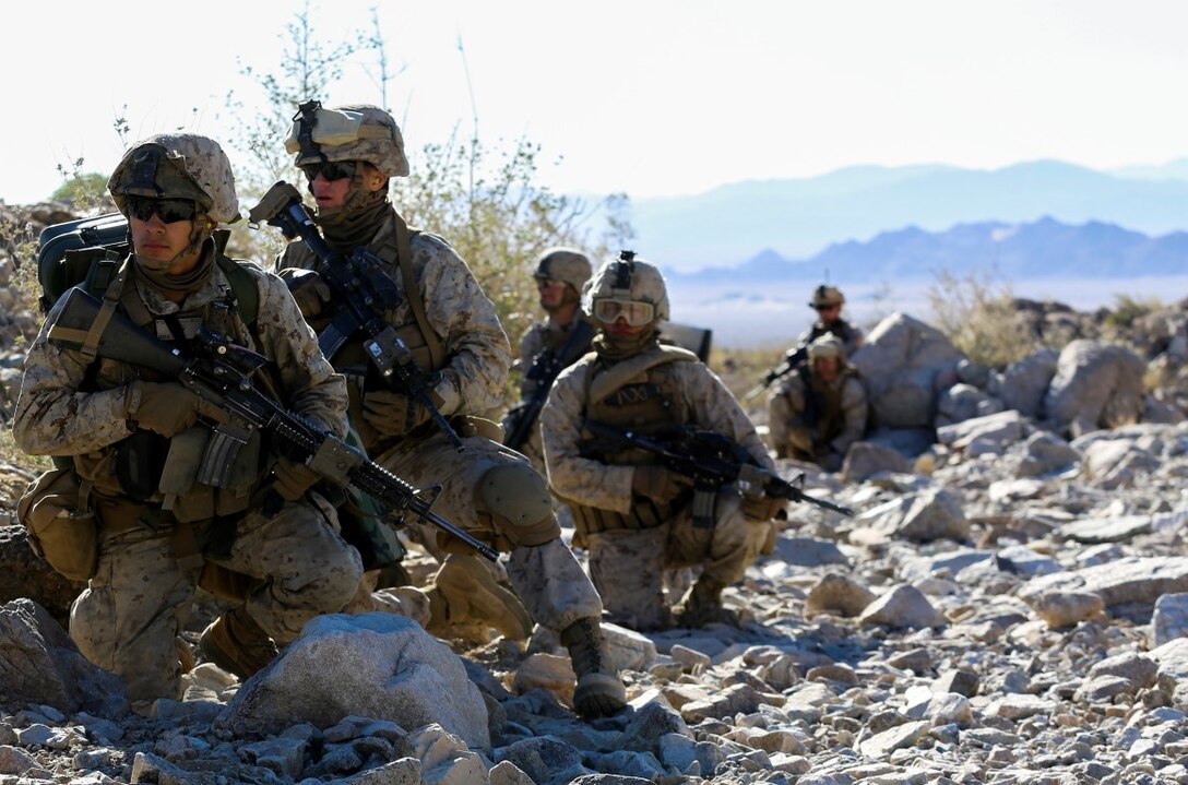 Marines with Company F, 2nd Battalion, 7th Marine Regiment, 1st Marine Division, prepare to commence a company level live-fire attack aboard Marine Corps Air Ground Combat Center Twentynine Palms, Calif., Jan. 24, 2016. The training was part of a series that will take place during Integrated Training Exercise 2-16, a Marine Air Ground Task Force sized training event led by the 5th Marine Regiment, which will forward deploy later this year with various elements to create the Special Purpose MAGTF Crisis Response Central Command 16.2. (U.S. Marine Corps photo by Cpl. Danielle Rodrigues/Released)