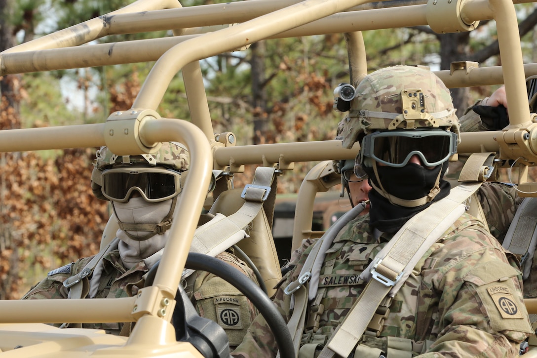 Army Spc. Salewski, right, scans the area before continuing test driving the MRZR4 LT-All Terrain Vehicle on Fort Bragg, N.C., Jan. 21, 2016. Salewski is assigned to the 82nd Airborne Division’s 1st Battalion, 504th Parachute Infantry Regiment, 1st Brigade Combat Team. Army photo by Sgt. Juan F. Jimenez