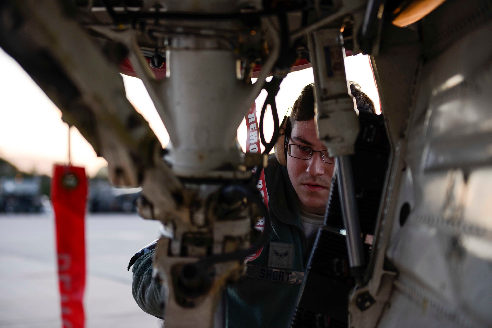 Airman 1st Class Samuel Short, a crew chief assigned to the 480th Expeditionary Fighter Squadron, inspects the front wheel assembly of an F-16 Fighter Falcon during a flying training deployment on the flightline at Souda Bay, Greece, Jan. 27, 2016. Approximately 300 personnel and 18 F-16s from the 52nd Fighter Wing at Spangdahlem Air Base, Germany, supported flight during the FTD as part of U.S. Air Forces in Europe-Air Forces Africa's Forward Ready Now stance. (U.S. Air Force photo/Staff Sgt. Christopher Ruano)