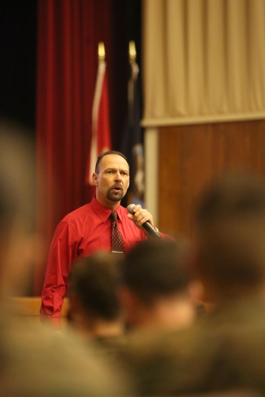 More than 200 Marines with Combat Logistics Regiment 25 filled the base theater to listen to motivational speaker Todd Parisi at Camp Lejeune, N.C., Jan. 28, 2016. Parisi, a former Sgt. Maj. with 28 years of service to the Marine Corps, now travels talking to groups of civilians and service members. (U.S. Marine Corps photo by LCpl. Miranda Faughn/Released)