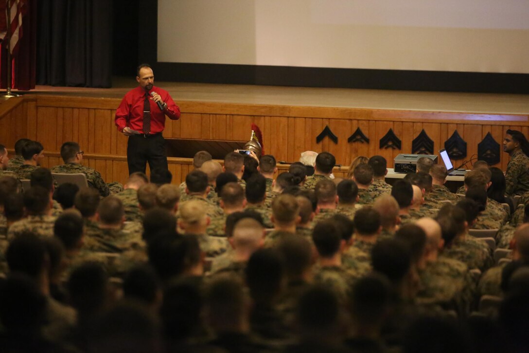 More than 200 Marines with Combat Logistics Regiment 25 filled the base theater to listen to motivational speaker Todd Parisi at Camp Lejeune, N.C., Jan. 28, 2016. Parisi emphasized, like everything in the Marine Corps, respect is earned. “Regardless of rank, Marines will loan you respect as one Marine to another, but after a while that has to be earned too,” said Parisi. (U.S. Marine Corps photo by LCpl. Miranda Faughn/Released)