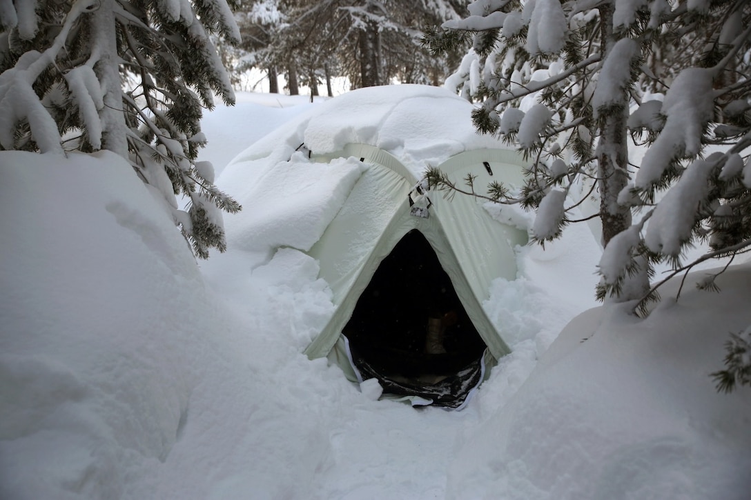 A cold weather tent built by Marines with Combat Logistics Battalion 252 is covered in snow in the mountains of Bridgeport, Calif., during Mountain Exercise 1-16, a cold weather training exercise, Jan. 15, 2016. The training is a prerequisite for a large, multi-national exercise called Cold Response 16 that will take place in Norway, March of this year. Cold Response will challenge 12 NATO allies’ and partners’ abilities to work together and respond in the case of a crisis. (U.S. Marine Corps photo by Lance Cpl. Brianna Gaudi/released)