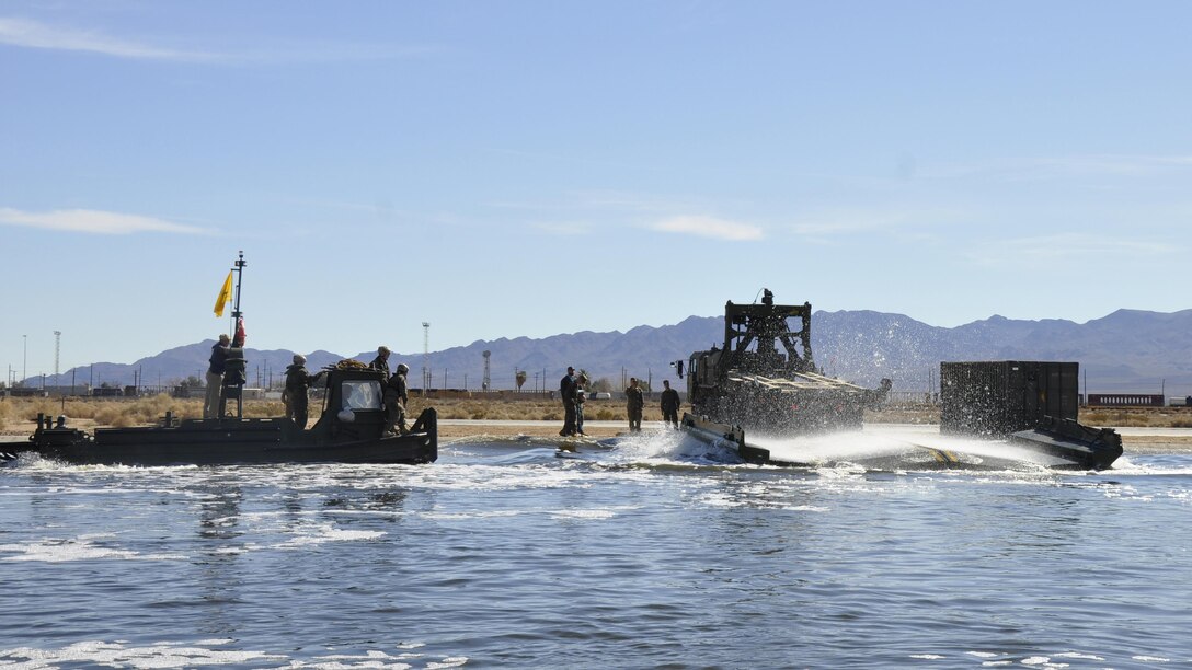 Marines with 7th Engineer Support Battalion test Improved Ribbon Bridge components with representatives from Marine Corps Systems Command, and Marine Corps Engineer School, at the test pond aboard Marine Corps Logistics Base Barstow’s Yermo Annex, Calif., Jan. 25. Function checks are performed on the IRB before it is sent to the Operating Forces in order to ensure that they receive properly working equipment, said Gunnery Sgt. Quinton Shearer, Bridging Project Officer with Marine Corps Systems Command. 