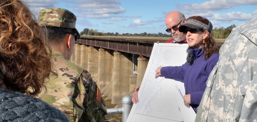 Sara Schultz, water resource planner with the U.S. Army Corps of Engineers Sacramento District, briefs a team of USACE South Pacific Division leaders including Brig. Gen. Mark Toy, South Pacific Division commander.