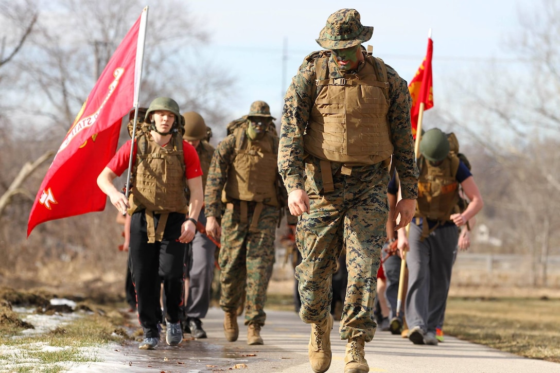 Recruiting Sub-Station Quad Cities' Pool Function on January 30, 2016 started off with a max set of pull-ups and two minutes of crunches. Afterwards, the Poolees were given some Marine Corps knowledge, tips, and tricks for their 5 mile hike soon to follow.