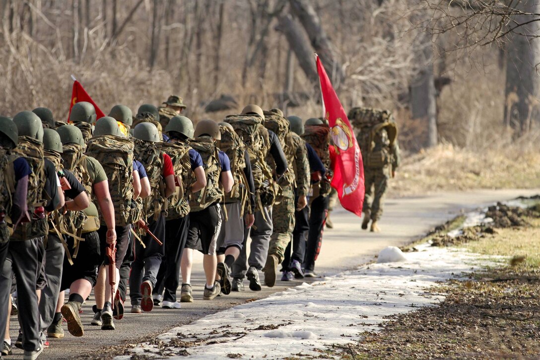 Recruiting Sub-Station Quad Cities' Pool Function on January 30, 2016 started off with a max set of pull-ups and two minutes of crunches. Afterwards, the Poolees were given some Marine Corps knowledge, tips, and tricks for their 5 mile hike soon to follow.