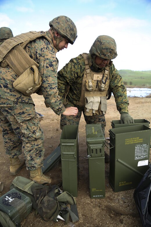 Cpl. Juan Castillo, Jr. (left) and Lance Cpl. Jorge Peralta Roman, mortarmen with 2nd Battalion, 23rd Marine Regiment, 4th Marine Division, inspect mortar rounds during a call-for-fire joint-training exercise with 6th Air Naval Gunfire Liaison Company, Force Headquarters Group, Jan. 23, 2016 at Camp Roberts, Calif. The Marines of 6th ANGLICO conducted call-for-fire exercises and machine gun ranges alongside mortar platoons from 2/23 to complete comprehensive live-fire training. 