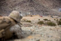 U.S. Marines with 2nd Battalion, 7th Marine Regiment, and 1st Combat Engineer Battalion conduct platoon supported live fire attacks on Range 410A during Integrated Training Exercise 2-16 at Marine Corps Air Ground Combat Center Twentynine Palms, Calif., Jan. 22, 2016. Marines with 2/7 are currently participating in Integrated Training Exercise 2-16 in preparation for deployment with Special Purpose Marine Air Ground Task Force - Crisis Response - Central Command. (U.S. Marine Corps Combat Camera photo by Cpl. Trever A. Statz/Released)