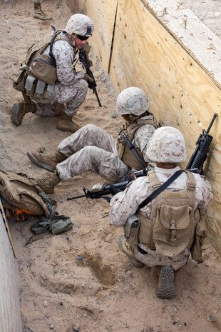 U.S. Marines with 2nd Battalion, 7th Marine Regiment, and 1st Combat Engineer Battalion conduct platoon supported live fire attacks on Range 410A during Integrated Training Exercise 2-16 at Marine Corps Air Ground Combat Center Twentynine Palms, Calif., Jan. 22, 2016. Marines with 2/7 are currently participating in Integrated Training Exercise 2-16 in preparation for deployment with Special Purpose Marine Air Ground Task Force - Crisis Response - Central Command. (U.S. Marine Corps Combat Camera photo by Cpl. Trever A. Statz/Released)