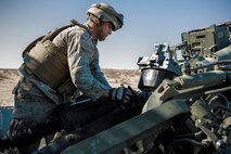 U.S. Marine Corps Lance Cpl. Jesse Hartman, a cannoneer with Battery A, 1st Battalion, 12th Marine Regiment, cleans an M777 Howitzer during Fire Support Coordination Exercise (FSCEX) during Integrated Training Exercise 2-16 at Marine Corps Air Ground Combat Center Twentynine Palms, Calif., Jan. 24, 2016. The battalion participated in FSCEX to enhance their skillset and proficiency pertaining to suppression of enemy air defense and supporting the ground scheme of maneuver. (U.S. Marine Corps photo by Cpl. Trever A. Statz/Released)