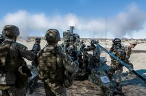 U.S. Marines with Battery A, 1st Battalion, 12th Marine Regiment, provide artillery fire support for Fire Support Coordination Exercise (FSCEX) during Integrated Training Exercise 2-16 at Marine Corps Air Ground Combat Center Twentynine Palms, Calif., Jan. 24, 2016. The battalion participated in FSCEX to enhance their skillset and proficiency pertaining to suppression of enemy air defense and supporting the ground scheme of maneuver. (U.S. Marine Corps photo by Cpl. Trever A. Statz/Released)
