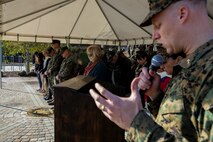 U.S. Marine Corps Col. Paul J. Nugent, commanding officer, Headquarters Battalion, 1st Marine Division, relinquishes command to Lt. Col. Michael Nakonieczny during a change of command ceremony at Marine Corps Base Camp Pendleton, Calif., Jan. 7, 2016. A change of command is a military tradition that represents a formal transfer of authority and responsibility for a unit from one commanding officer to another. (U.S. Marine Corps photo by Lance Cpl. Nathaniel Castillo, 1st Marine Division Combat Camera/Released)