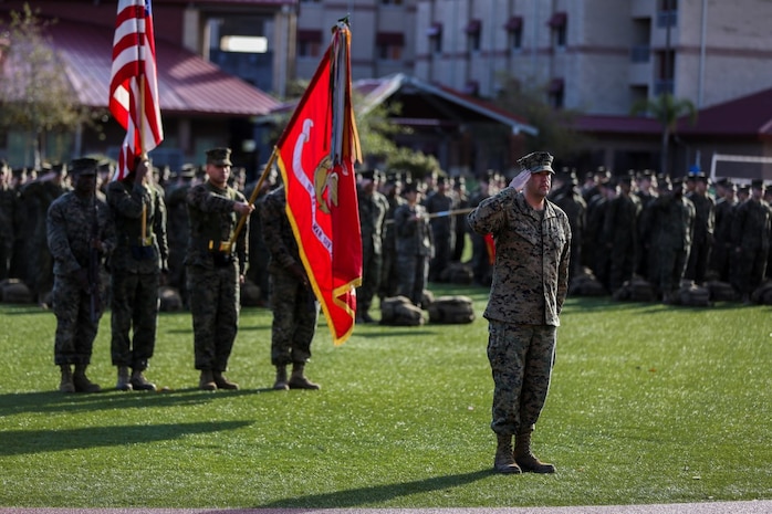 U.S. Marine Corps Col. Paul J. Nugent, commanding officer, Headquarters Battalion, 1st Marine Division, relinquishes command to Lt. Col. Michael Nakonieczny during a change of command ceremony at Marine Corps Base Camp Pendleton, Calif., Jan. 7, 2016. A change of command is a military tradition that represents a formal transfer of authority and responsibility for a unit from one commanding officer to another. (U.S. Marine Corps photo by Lance Cpl. Nathaniel Castillo, 1st Marine Division Combat Camera/Released)