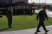 U.S. Marine Corps Col. Paul J. Nugent, commanding officer, Headquarters Battalion, 1st Marine Division, relinquishes command to Lt. Col. Michael Nakonieczny during a change of command ceremony at Marine Corps Base Camp Pendleton, Calif., Jan. 7, 2016. A change of command is a military tradition that represents a formal transfer of authority and responsibility for a unit from one commanding officer to another. (U.S. Marine Corps photo by Lance Cpl. Nathaniel Castillo, 1st Marine Division Combat Camera/Released)