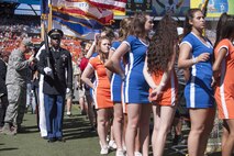 A joint honor guard detail prepares to render honors during the 2016 NFL Pro Bowl as part of the event’s pregame show at Aloha Stadium in Honolulu, Jan. 31, 2016. More than 200 military volunteers worked together to construct the pregame show stage in support of Rachel Platten’s performance of her song “Fight Song.” The U.S. military also conducted a C-17 Globemaster flyover and U.S. Pacific Command leadership participated in the game’s coin toss. DoD photo by Staff Sgt. Christopher Hubenthal