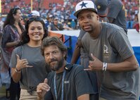 Air Force Staff Sgt. Xenia Dillon, left, 15th Aerospace Medical Squadron, poses for a photo during the 2016 NFL Pro Bowl at Aloha Stadium in Honolulu, Jan. 31, 2016. Dillon was one of more than 200 military volunteers who helped to construct the pregame show stage in support of Rachel Platten’s performance of her song “Fight Song.” The U.S. military also conducted a C-17 Globemaster flyover and U.S. Pacific Command leadership participated in the game’s coin toss. DoD photo by Staff Sgt. Christopher Hubenthal