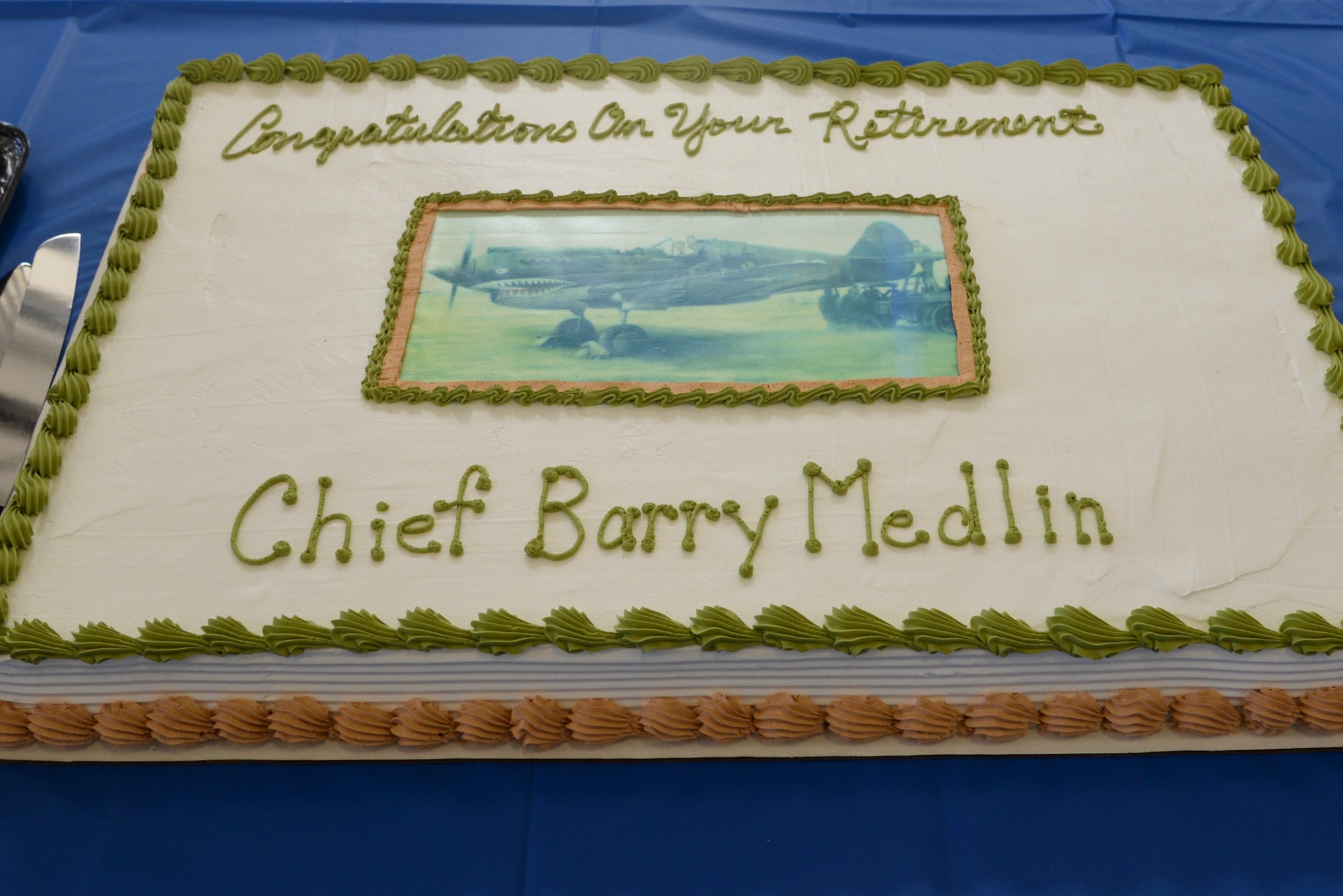 A cake rests on a table during a retirement ceremony honoring U.S. Air Force Chief Master Sgt. William Medlin, 23d Maintenance Group superintendent, Jan. 29, 2016, at Moody Air Force Base, Ga. The Columbus, Ga. native retired after serving 30 years and one day in the Air Force.  (U.S. Air Force photo by Airman 1st Class Janiqua P. Robinson/Released)