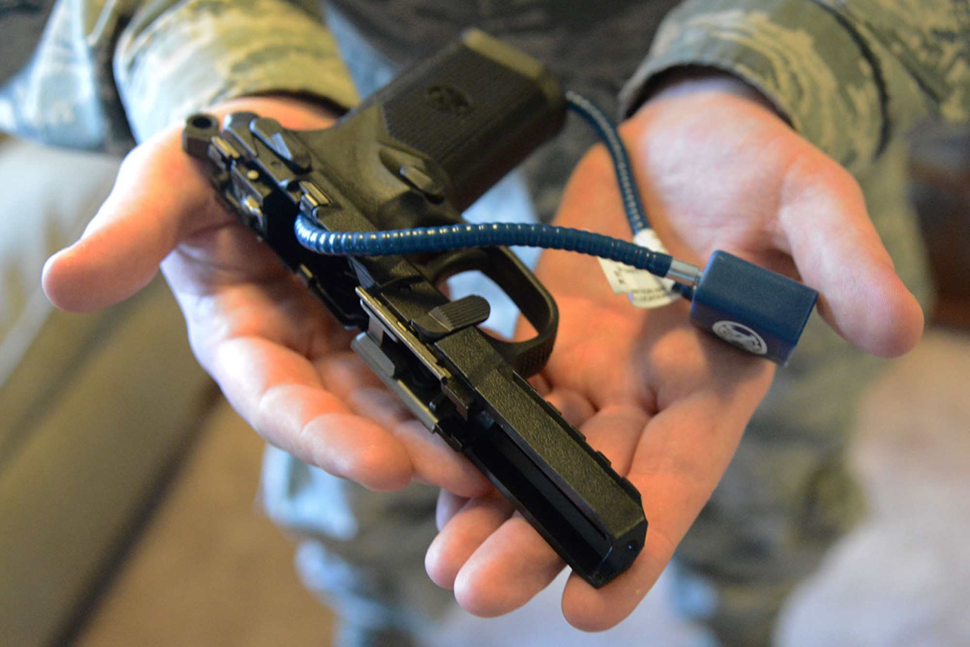 Gun locks are safety items required when privately owned weapons are stored in cases that can be easily breached. JBER Instruction 31-107, Weapons Registration and Child Access Prevention Policy, illustrates proper weapon registration, transportation and storage on base. (U.S. Air Force photo by Airman 1st Class Javier Alvarez)