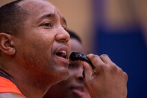 A player from the 52nd Logistics Readiness Squadron intramural basketball team watches as his team plays during the Intramural Championship inside the George Price Gymnasium Jan. 28, 2016, at Spangdahlem Air Base, Germany. The 52nd LRS intramural basketball team won the game capping off an undefeated season. (U.S. Air Force photo by Senior Airman Rusty Frank/Released)